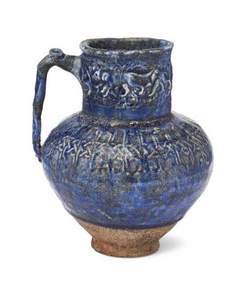 ArtChart | A moulded cobalt glazed jug, Kashan, Iran, 12th century by Unknown Artist