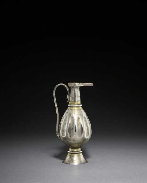 ArtChart | A Sassanian or early Islamic silver ewer with vertical fluting, Persia, 7th-8th century by Unknown Artist