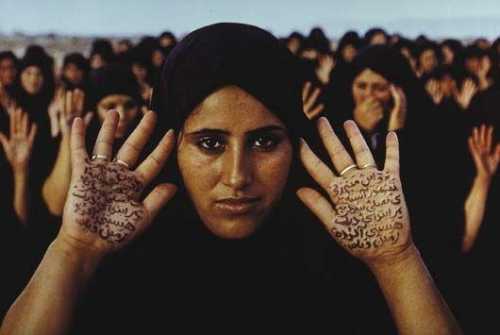 آرتچارت | Rapture Series (women with writing on hands) از شیرین نشاط